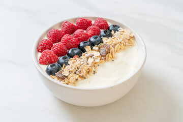 homemade yogurt bowl with raspberry, blueberry and granola