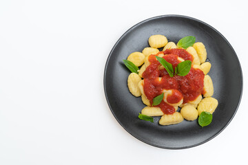 gnocchi in tomato sauce with cheese