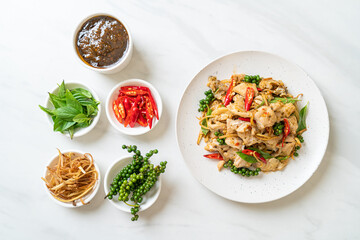 stir fried holy basil with fish and herb