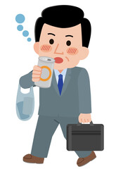 帰宅途中に飲酒しながら歩く男性