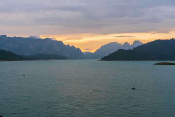 Beautiful sunset sky with dramatic light from top view of the dam