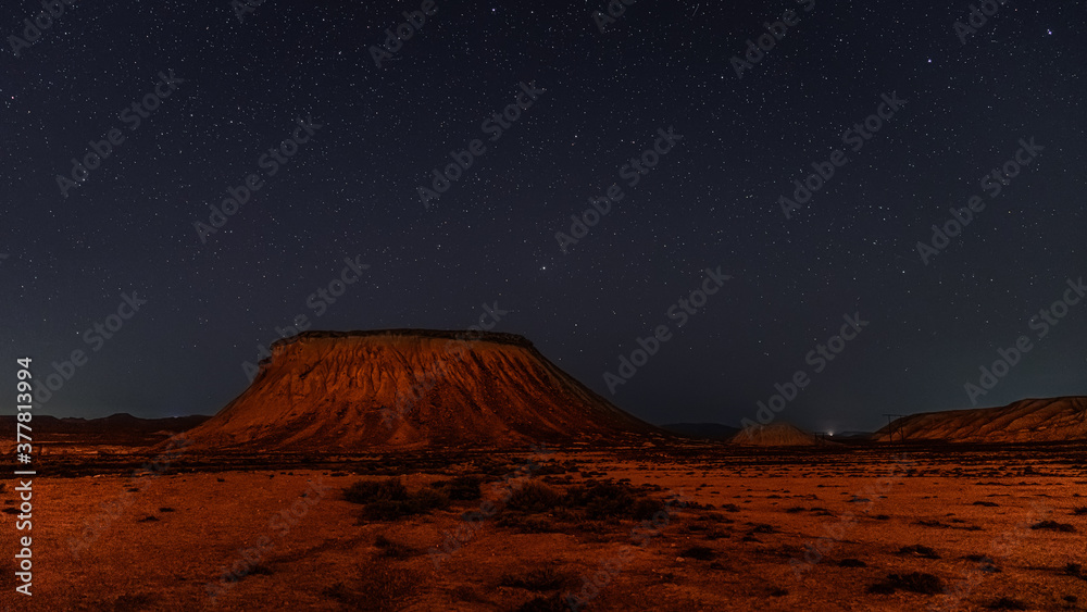 Wall mural night starry sky over mountains