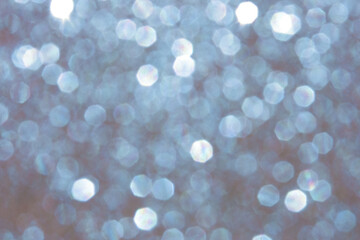 Abstract blurred silver blue background with bokeh lights. Celebration, party, Christmas concept.