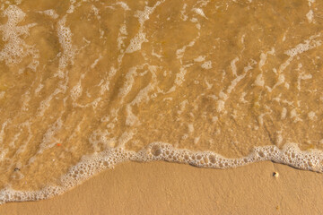 Soft wave of sea on sandy beach