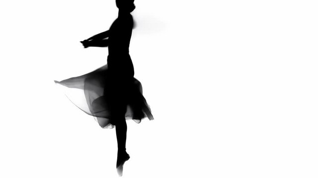 Silhouette of ballerina in skirt dancing isolated on white 