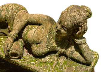 A statue of an angel, a fairy woman, a fairy woman in fairy tales or bare-busted literature on display outdoors. Exposed to rain and moisture, green moss was formed throughout the body.
