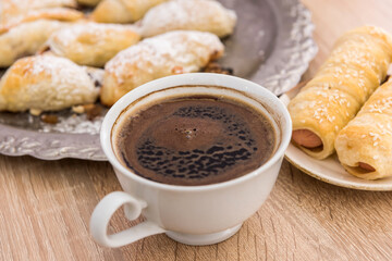 fresh tasty homemade buns with cup of coffee