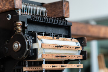 Thai style traditional hand-weaving loom being used to make cloth.Weaving machine Thai style.