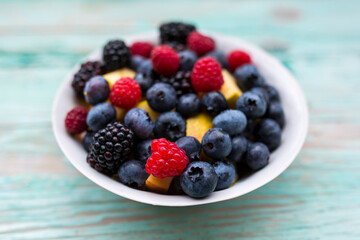 Fresh berries in a bowl. Healthy diet.