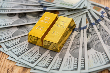 Investing in real gold bullion on dollar bills