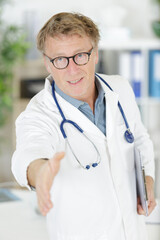 doctor shaking hands at hospital