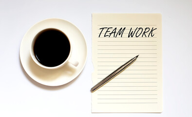 TEAM WORK - white paper with pen and coffee on white background