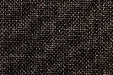 Black textile background with unique surface.
