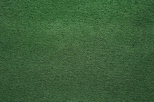Saturated green fabric texture.