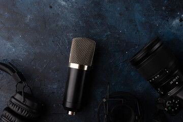 Microphone for recording the voice isolated on dark blue background. Music concept.