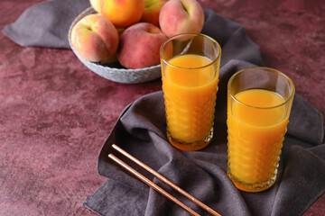 Composition with fresh peach juice on table