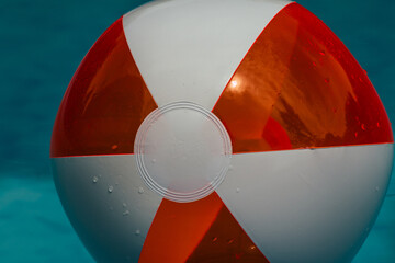 Close-up of an inflatable Water Ball on the Water Surface of a Swimming Pool