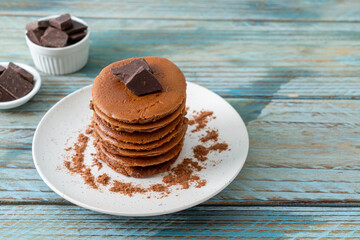 chocolate pancake stack on plate