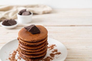 chocolate pancake stack on plate