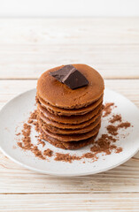 chocolate pancake stack on plate