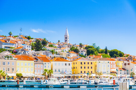 Beautiful town of Mali Losinj on the island of Losinj, Croatia, marina and city skyline with cathedral tower
