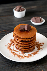 chocolate pancake stack on plate