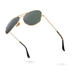 Classic aviator sunglasses with golden frame isolated on white.