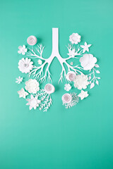 Flowers arranged in shape of human lungs as symbol of healthy life