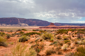 Red sandy desert at Monument Valley, Arizona, USA