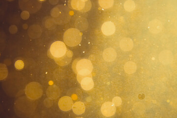 Dark Abstract Gold bokeh sparkle on black