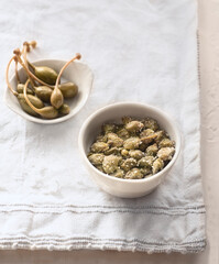 Various types of capers: salted and pickled. Mediterranean flavors

