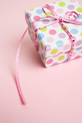 gift box with pink ribbon
