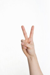 man's hand making peace sign on white background