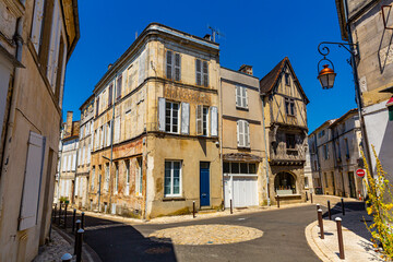 Picturesque view of streets and old houses of Cognac town in Charente department, southwestern...