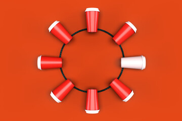 A lot of red cups for coffee lie in a circle. The concept of a coffee break