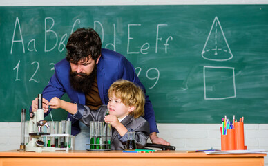 Childhood upbringing and education. Boy pupil achieving education. Teacher and child school...