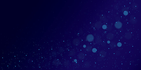 Glowing particles on blue background