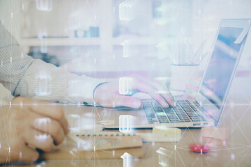 Businessman working on Laptop with technology theme drawing. Concept of big data. Double exposure.