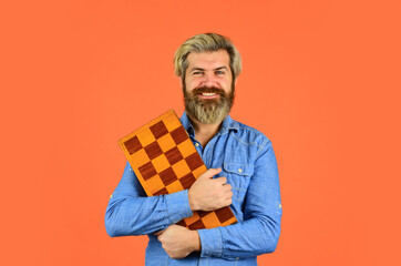 Cognitive skills. Hobby and leisure. Intellectual games. Chess lesson. Chess figures. Teacher chess competition. Game strategy concept. Board game. Man playing chess. Intelligent bearded hipster.