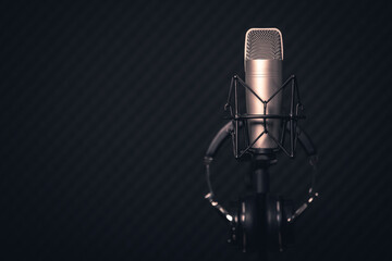 Sound and voice recording studio with nobody. Vintage style microphone and tools for record in room...