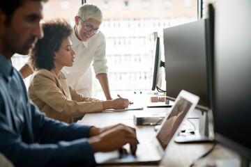 Startup programmer people group working everyday job at modern office