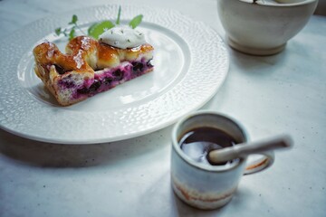 Cherry pie. Breakfast in cafe. Traditional florentine schiacciata with grapes. Coffe time.