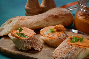 Squash puree (squash caviar) in a glass jar and on  slices of bread.Homemade caviar of vegetables 