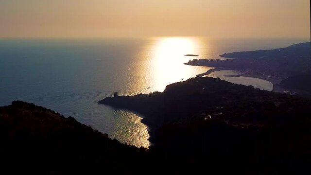 Areal view of Marina di Camerota city in backlight at sunset