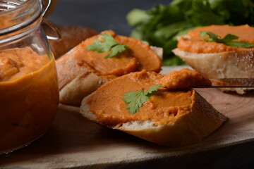 Squash puree (squash caviar) in a glass jar and on  slices of bread.Homemade caviar of vegetables 
