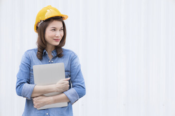 Female engineer working at construction site.
