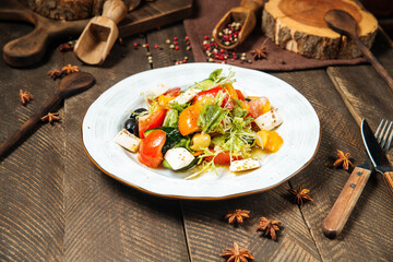 Greek vegetable salad with feta cheese and olives