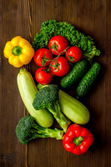 A tabletop arrangement of fresh vegetables multicolored, top view