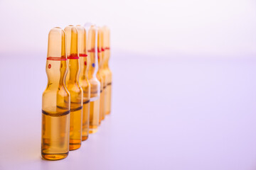 Copy space photo medical ampoules on a white background. Close-up