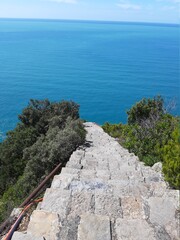 Cinque Terre, Italy - 09/02/2020: Beautiful landscape of a coastal fishing village, amazing view on many little colorful houses, traditional architecture of the little Italian town called Cinque Terre